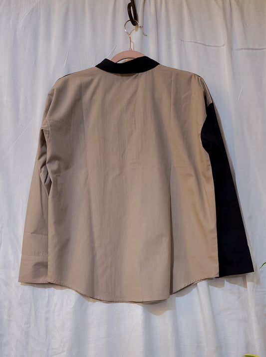 This Shirt stands out with its color-blocking cut , giving you a fun statement piece perfect for any setting. Pair with jeans or shorts for a modern, laid-back look.