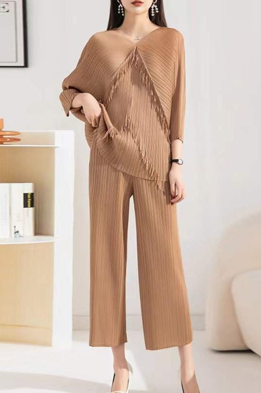 kimono top with fringe detailing and straight ankle length pants.