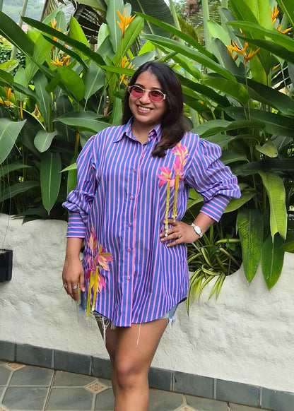 purple and Pink vertically striped button-down shirt with pink floral embroidery 